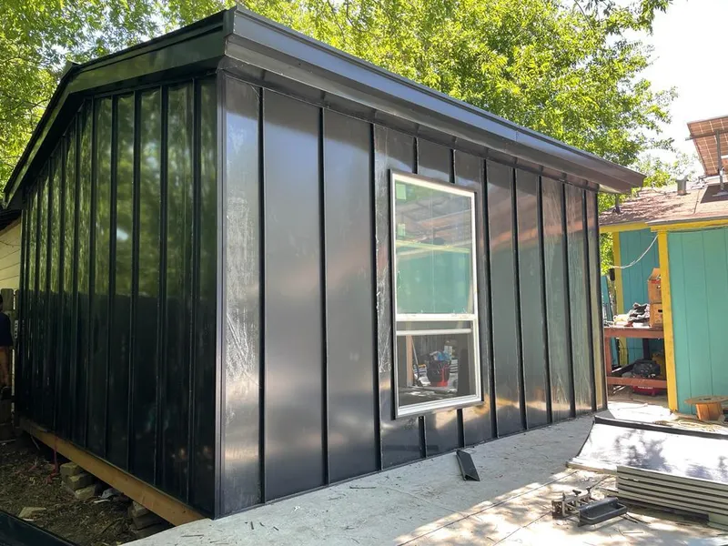 Black standing seam metal wall panels for Roof Inspection in Camp Hill